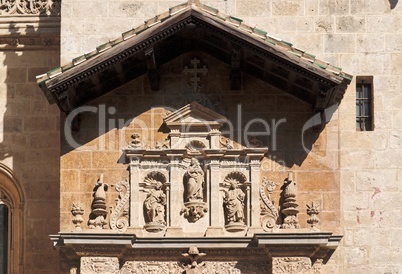 Statues above entrance to the cathedral of Granada, Spain