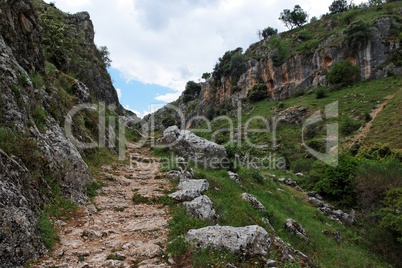 Trail in gorge Mirador de Bailon near Zuheros  in Spain in cloudy day