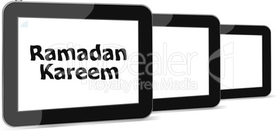 tablet pc with ramadan kareem word on it