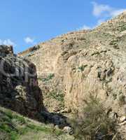 Desert mountain valley of Nachal Prat creek in spring