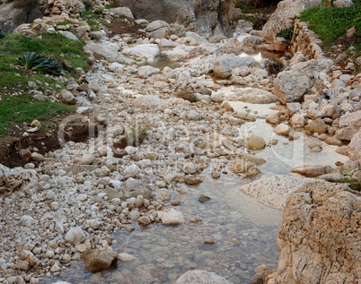 Pebble scree in a small mountain creek