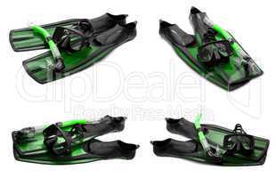 Set of green swim fins, mask and snorkel for diving on white bac