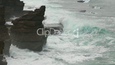 Waves Atlantic Ocean Breaking onto Rocks, closeup