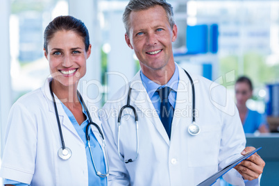 Happy doctors smiling at camera