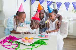 Happy family celebrating a birthday together