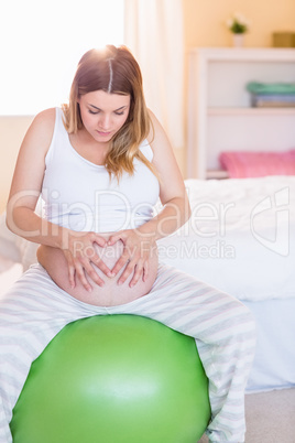 Pregnant woman keeping in shape