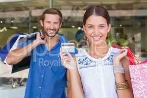 Young happy couple looking at camera