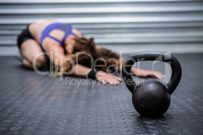 Muscular woman stretching