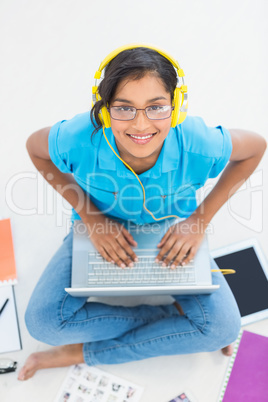 Casual businesswoman listening to music Casual businesswoman listening to music