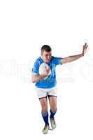 Rugby player running with the rugby ball