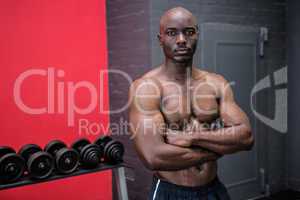 Young Bodybuilder posing in front of the camera