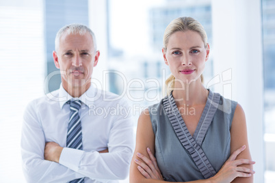 Two business people looking at the camera