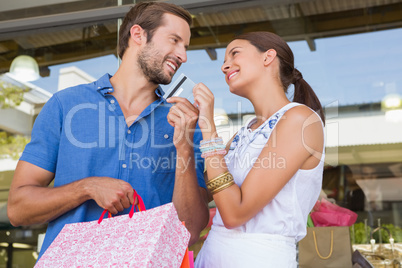 Young happy couple looking at each other