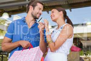 Young happy couple looking at each other