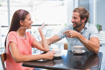 Young happy couple looking at each other