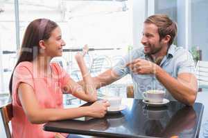 Young happy couple looking at each other