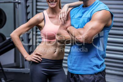 Young woman smiling with a young man