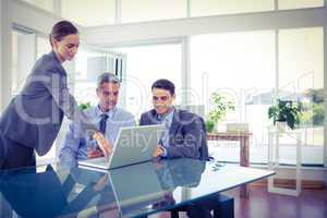 Business people working on laptop computer