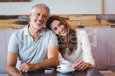 Cute couple drinking coffee