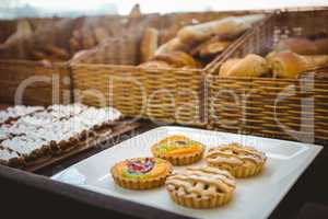 Close up of basket with fresh bread and pastry