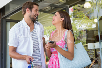 Happy couple smiling at each other