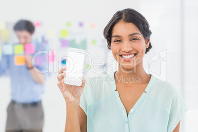 businesswoman showing her new phone