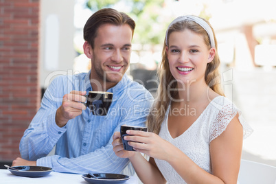 Cute couple drinking a coffee together