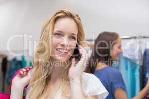 Pretty blonde talking on the phone