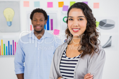 Young smiling business team looking at the camera