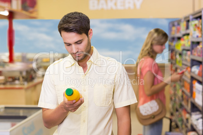 A handsome man buying products