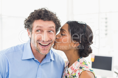 Portrait of a smiling casual young couple at work