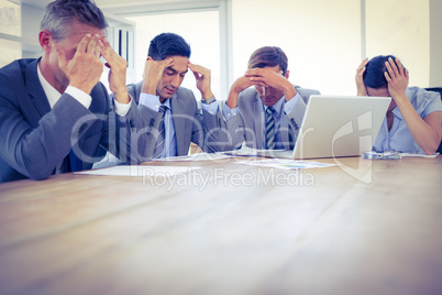 Thoughtful business people during meeting