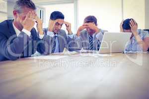 Thoughtful business people during meeting