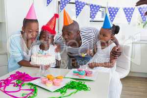 Happy family celebrating a birthday together