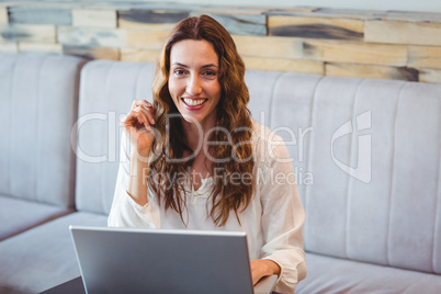 Young woman using laptop