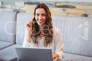 Young woman using laptop