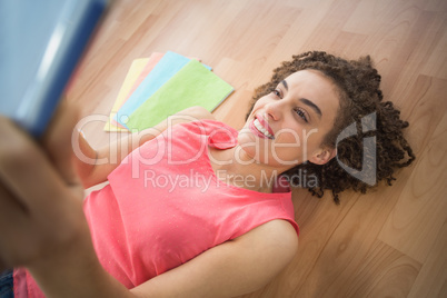 Young creative businesswoman taking a selfie