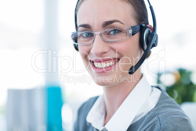 Close up view of happy businesswoman with headset