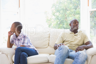 A dispute between a couple sitting on the couch
