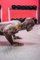 Young Bodybuilder doing push ups