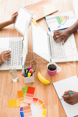 Young business people working at the laptops