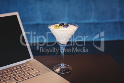 close up view of a laptop and a parfait