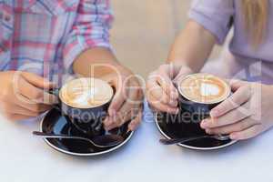 Close up of two cups of coffee