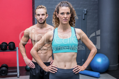 Muscular couple looking at the camera