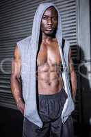 Young Bodybuilder in a hoodie looking at the camera