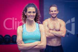 Muscular couple looking at the camera