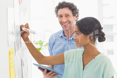 Business team analyzing charts together