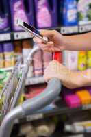 woman buy products and using his smartphone