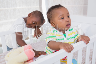 Babyboy and his brother in babyroom