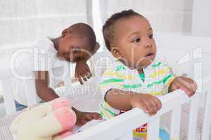 Babyboy and his brother in babyroom